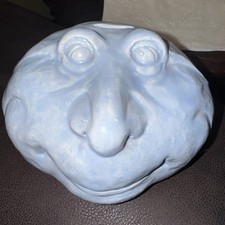 Portamonete in ceramica faccia