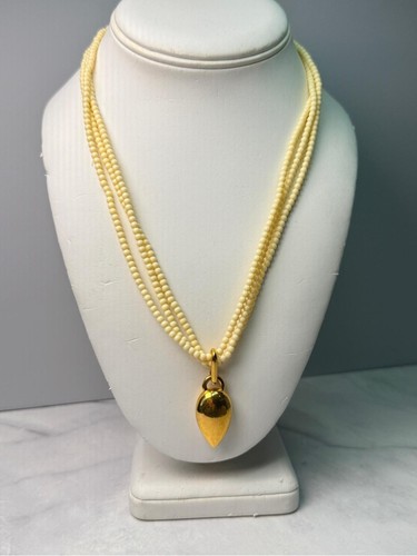 Collana con ciondolo multifilo