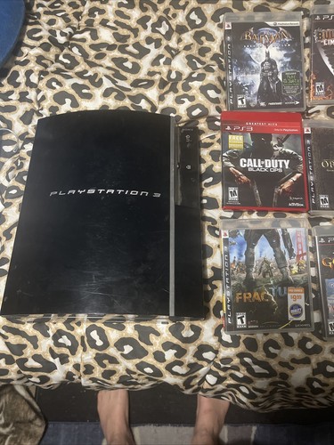 Playstation with games - with,