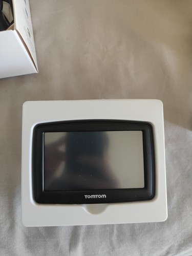 Navigatore satellitare tom - navigatore,