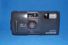 Olympus AF-1 super, testata