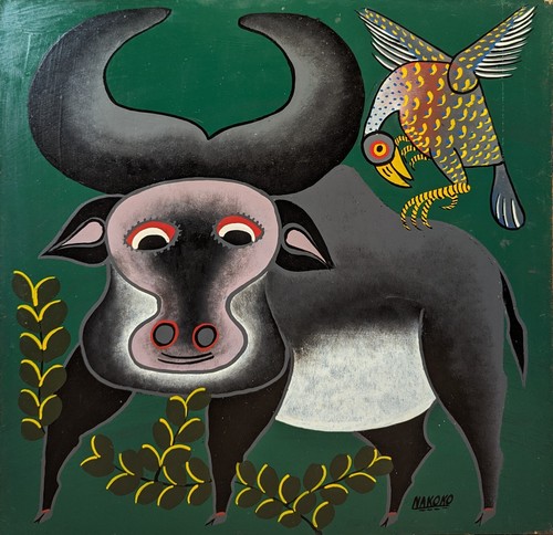 Nakoko bufalo and bird - bufalo,