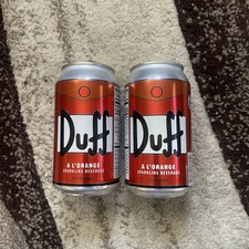Lattine di birra The SIMPSONS Duff ripiene di bevanda frizzante all'arancia