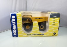 Dumper Komatsu 830E-AC scala