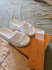 Mules Louis Vuitton indossati