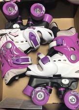 pattini a rotelle, caschetto parastinchi e paragomiti bambina 28/31