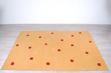 Tappeto design Paola Lenti feltro arancione con inserti quadrati rossi 290 x 190