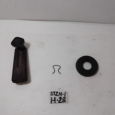 Maniglia marrone più fermo alzavetro Autobianchi A112 quarta serie (1977-1979).