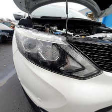 Faro proiettore anteriore lato