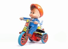 Giocattolo in latta a molla made in Japan marca  SUZUKI  buone condizioni