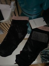 Calze Gucci a rete alla