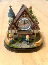 Orologio sveglia da tavolo camino a batteria vintage in resina forma casa orsi