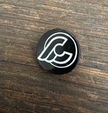 Tappo pulsante inserto logo