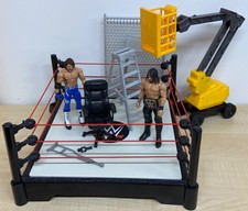 WWE talk wrestling ring con set accessori, figure AJ Styles & Seth Rollins