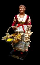 Pastore venditrice di spighe e