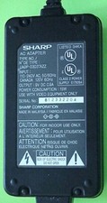 UN ORIGINALE SHARP OEM # UAPD-0303TAZZ, VIEW CAM CORDER, CARICABATTERIE / ADATTATORE AC 9VDC
