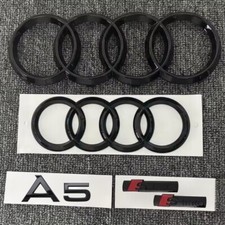 KIT COMPLETO LOGHI AUDI A5 nero lucido fregi ANTERIORE + POSTERIORE targhetta A5