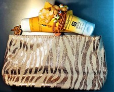 SOLEIL GENIFIQUE PROTEZIONE, RECONFORT DOPOSOLE, POCHETTE, COLLANA CONCHIGLIA