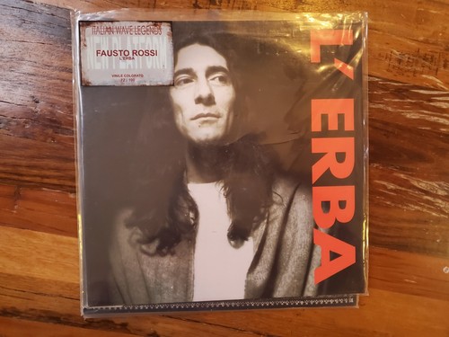 Erba red colored vinyl by - [red,