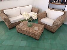 set da giardino in rattan composto da divano, poltroncina  e tavolinetto. 