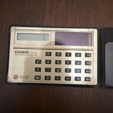 Calcolatrice Elettronica Solare Casio SL-702 Vintage Modello Slim Tascabile Funzionante