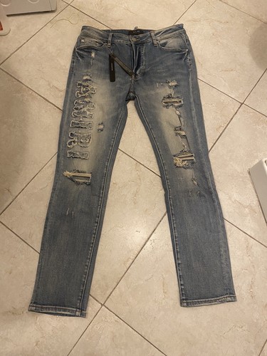 Jeans strappati uomo - strappati,