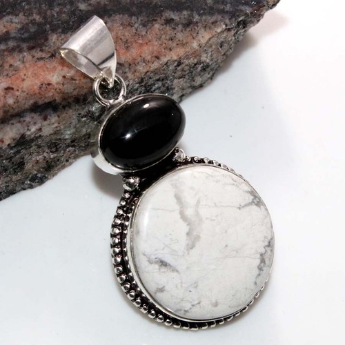 Ciondolo lungo tondo howlite