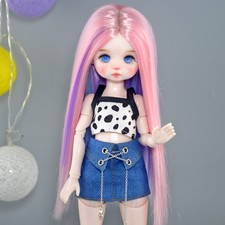 Bambola bambina occhi azzurri