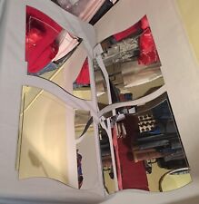 specchio a pannelli forma a