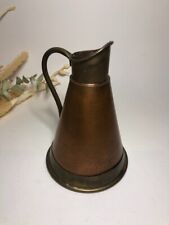 Pichet en cuivre réalisé par