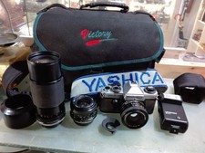 [NC] CORREDO YASHICA FX-D QUARTZ CON OBIETTIVI BORSA