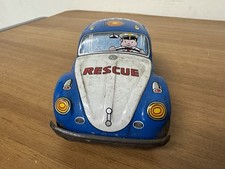 Macchina in latta a frizione