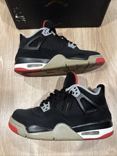 Jordan 4 Retro (GS) nero e
