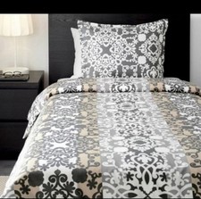 Set piumone singolo medaglione