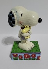 Statuina che abbraccia Peanuts