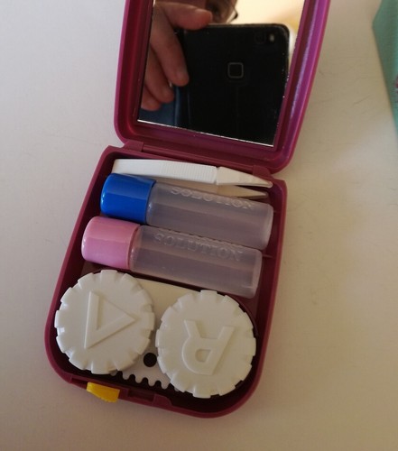 Contact lens case - /,