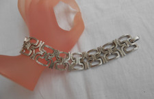 BRACCIALE firmato TRIFARI (c) metallo colore argento trifanium anni 60