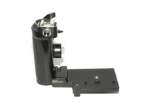 Poignée avec avance du film