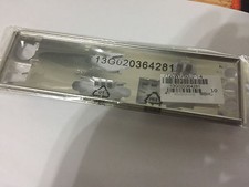 Scudo I/O originale nuovo per