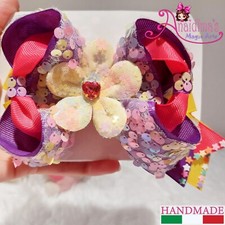 Fiocco viola, fucsia e giallo