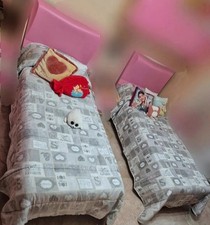 N.2 letti singoli con reti in legno