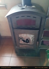 stufa a legna in ghisa usata