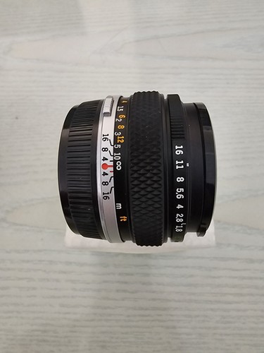 Olimpus mmf18f 50mm - 50,