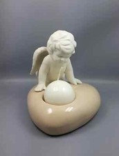 St.Eienne Angelo porcellana portacandela con candela  cm L 17 x h 12