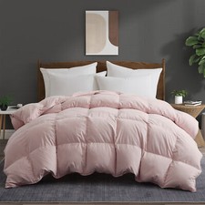 Copriletto in piuma oversize