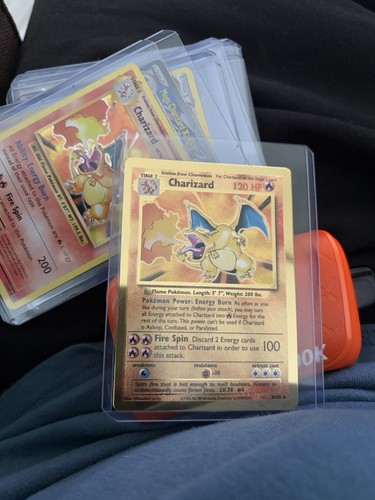 Carta pokemon charizard gold - pokemon,