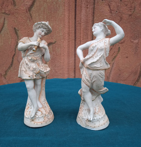 Coppia statuine in - di,