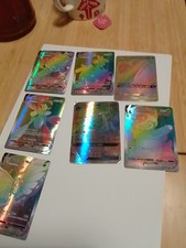 Carte Pokemon Arcobaleno PSA 9