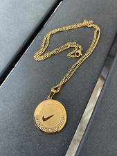NUOVA COLLANA NIKE ORO acciaio