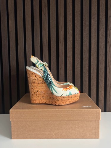Christian louboutin une - christian, plume